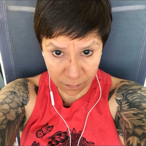 She's the raw flame 🔥 
The live wire 
She prays like a roman 
With her eyes on fire