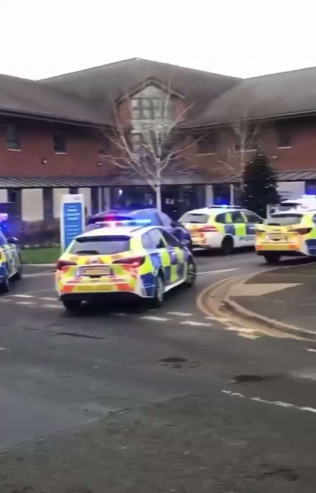 Another "new normal" day in "Modern England" as an Afghan is dragged out of Newton Community Hospita...