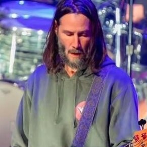 SOMEWHERE BETWEEN THE POWER LINES AND PALM TREES