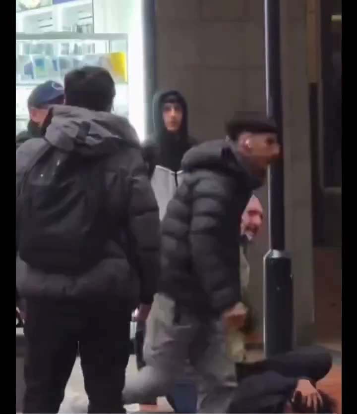 German man uses his body as a human shield to prevent a gang of invaders from killing a native boy.
...