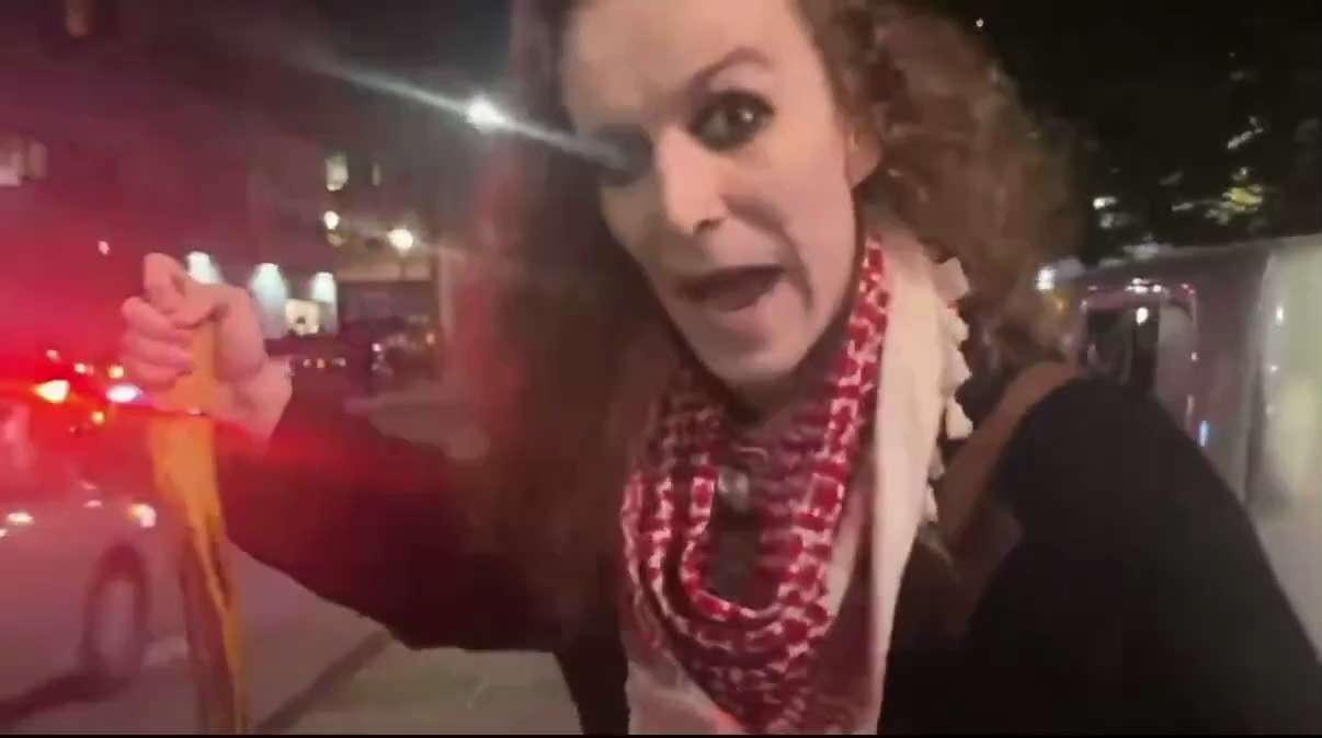 NOW: Antifa militant known as “Spearman” approaches right-wing activist RheinAmacher outside the hot...