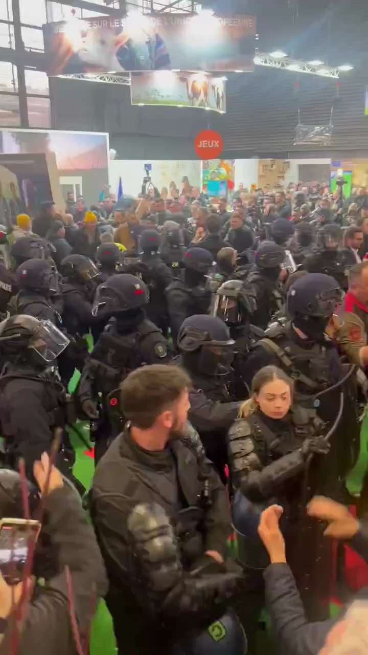 French farmers storm the International Agricultural Fair in
Paris searching for Macron, destroying a...